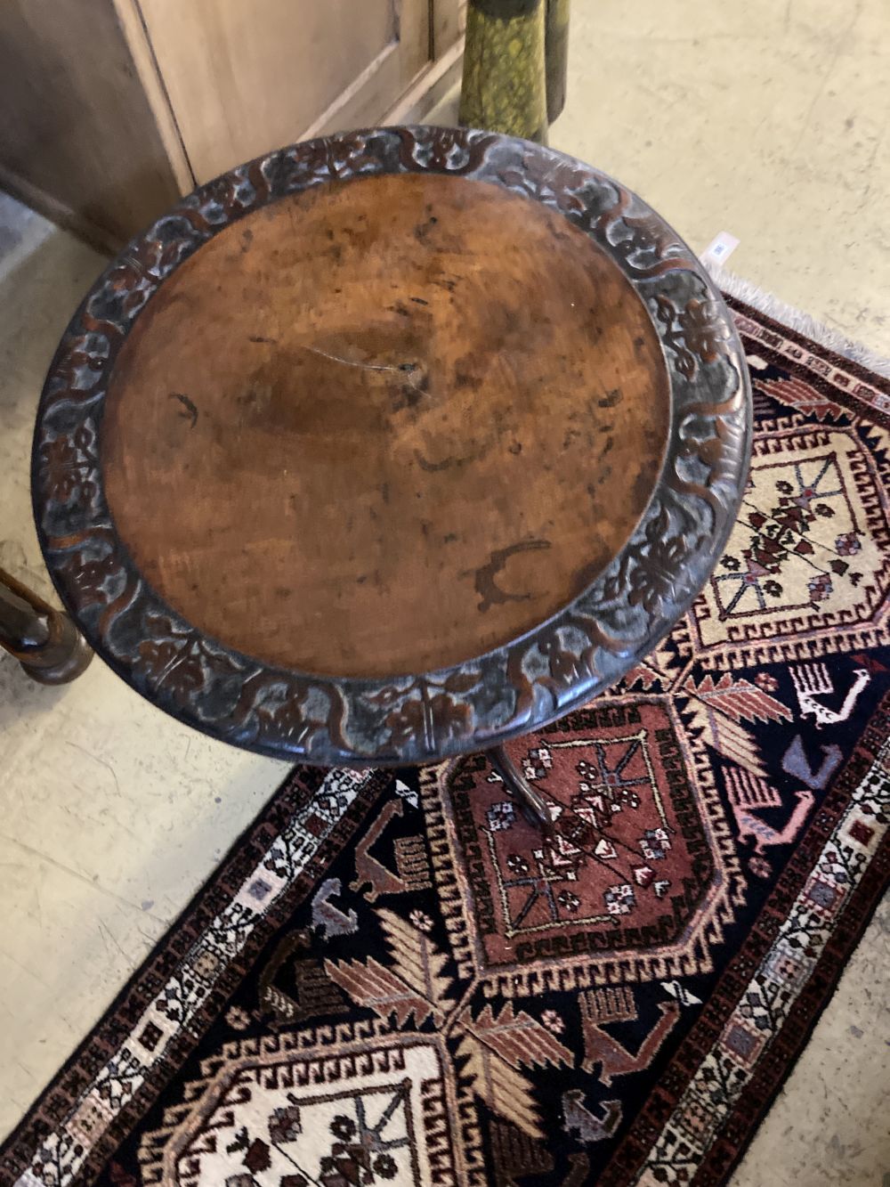 A Victorian carved walnut tripod wine table, diameter 44cm height 72cm